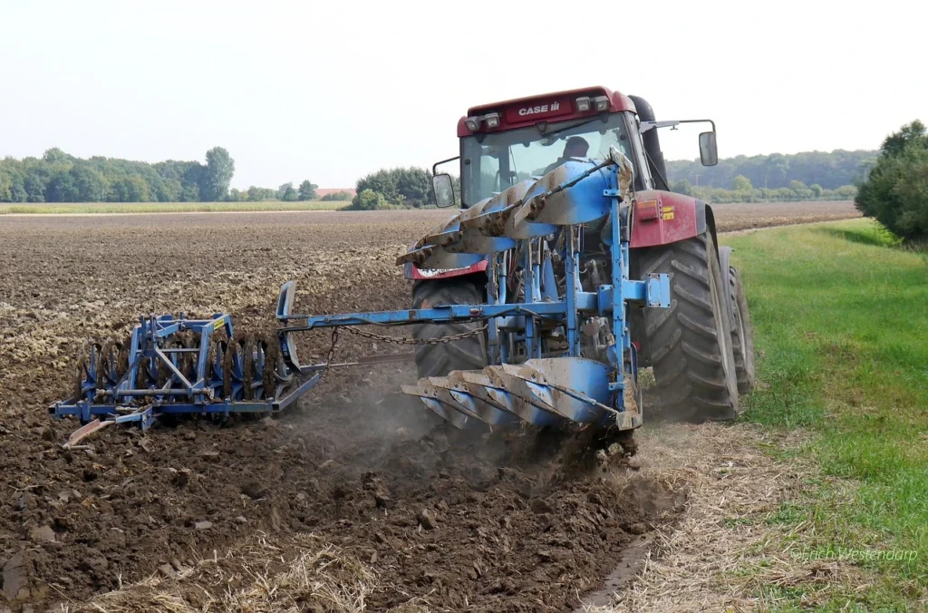 Ultimate Maize Farming Guide in Kenya: Best Practices, Seasons, and Tips 2 plowing using a tractor